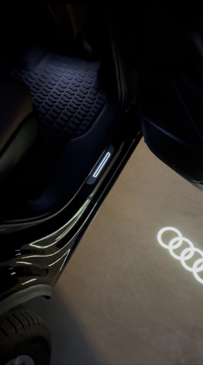 Audi door sill and floor mats after an interior detail in Allen